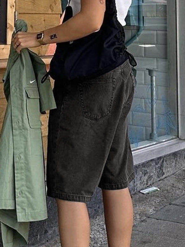 Short en jean taille haute à jambe droite