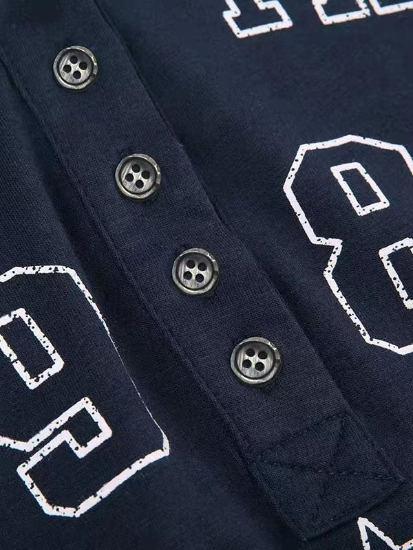 Marineblauwe vintage top met lange mouwen en letterlogo