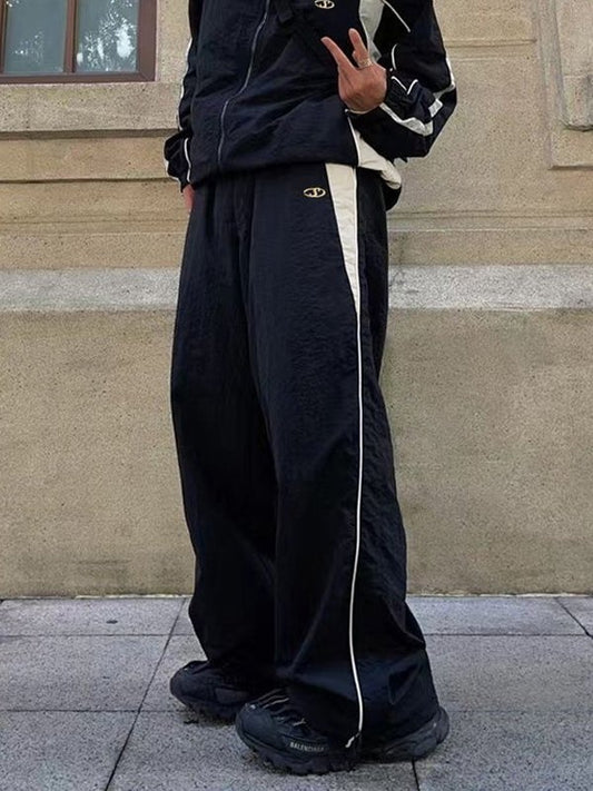 Baggy parachutebroek met contrasterende kleuren en retro panelen