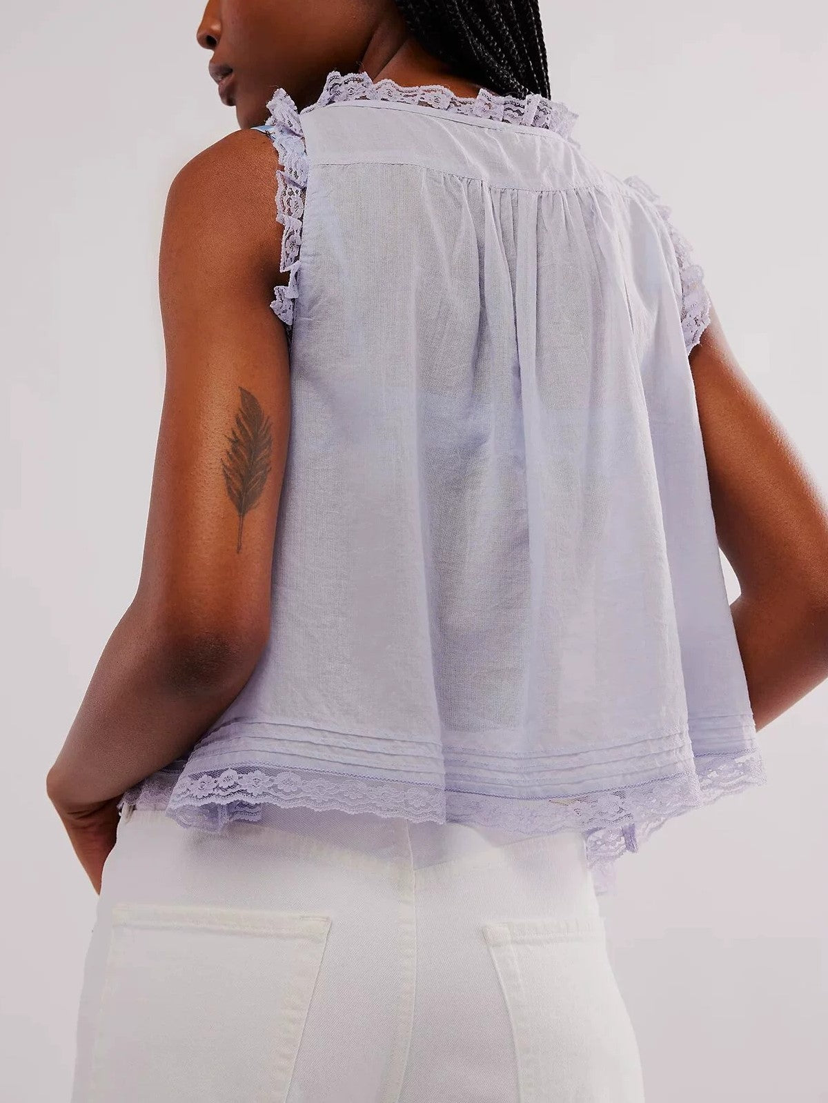 Débardeur cardigan à volants ajourés de couleur unie