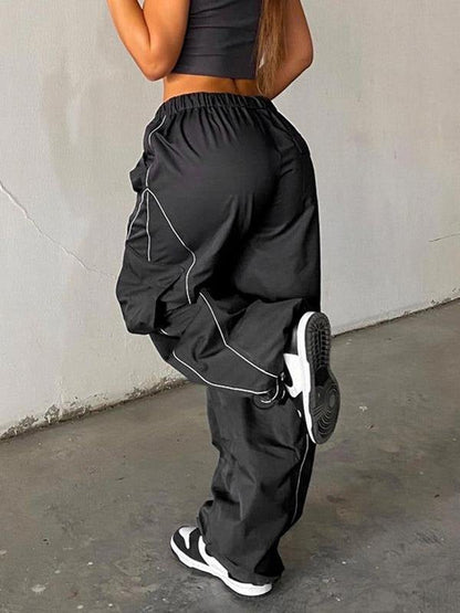 Black Parachute Pants with Cargo Pockets and Piping Detail