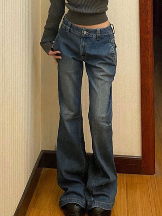 Vintage noodlijdende laagbouw flare jeans