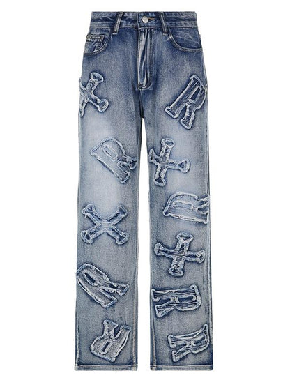 Boyfriend-jeans met vervaagd effect en letterpatch