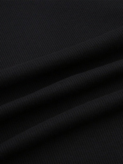 Zwarte gebreide mini-jurk met lange mouwen