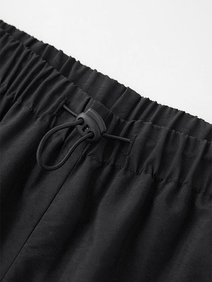 Pantalon de jogging sport rétro Baggy noir avec passepoil latéral