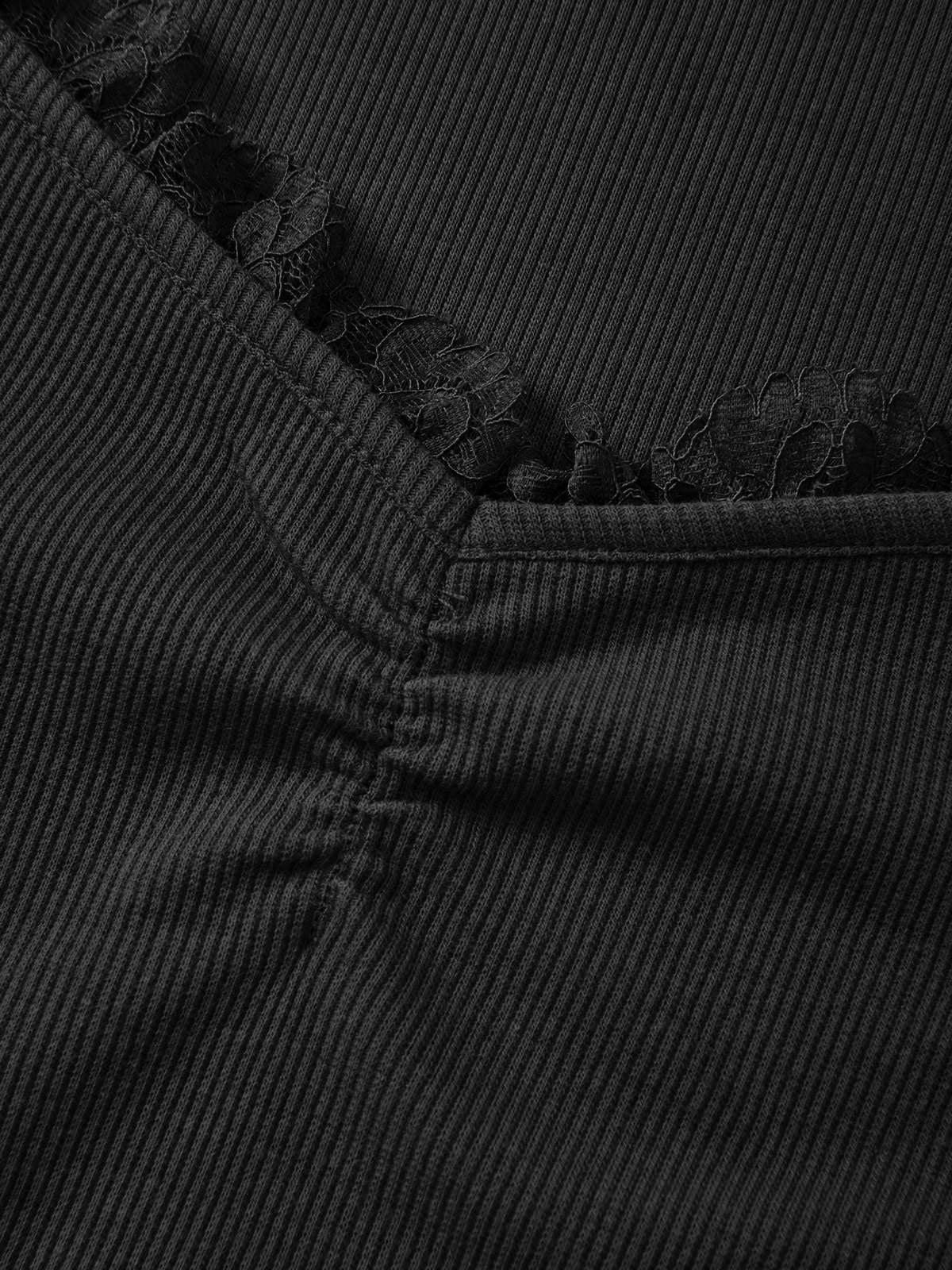 Top en tricot noir à manches longues avec détail en dentelle