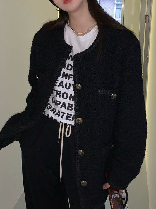 Zwart vintage tweed jasje met knoop aan de voorkant